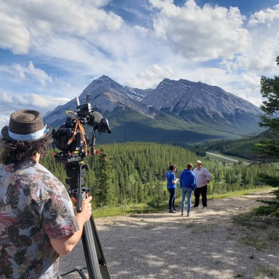 On set directing an episode of Hors Québec in the Rockies, 2022
