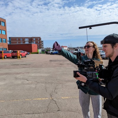 On set directing an episode of C_est moi qui décide in Moncton, 2023